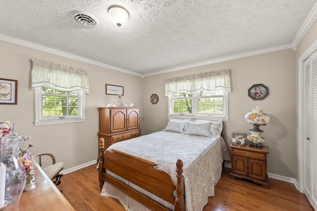 223 Lanetown Rd, Nancy, KY 42544 - bedroom featuring crown molding, baseboards, visible vents, and wood finished floors