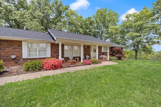 223 Lanetown Rd, Nancy, KY 42544 - single story home featuring brick siding, a front yard, and a porch