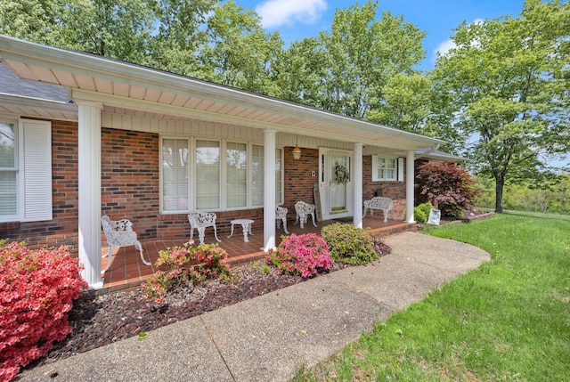 223 Lanetown Rd, Nancy, KY 42544 - entrance to property with a yard, a porch, and brick siding