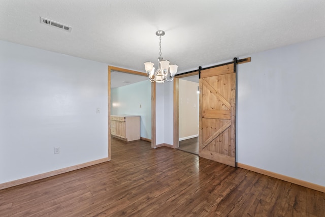 30 Wheeler St, South Shore, KY 41175 - unfurnished dining area featuring a barn door, a chandelier, baseboards, wood finished floors, and visible vents