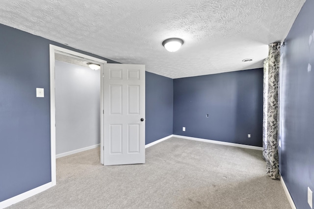 30 Wheeler St, South Shore, KY 41175 - below grade area featuring carpet floors, a textured ceiling, and baseboards