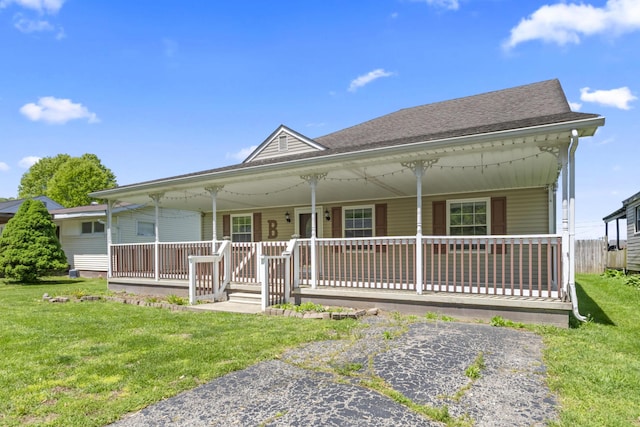 30 Wheeler St, South Shore, KY 41175 - farmhouse with roof with shingles, covered porch, and a front yard