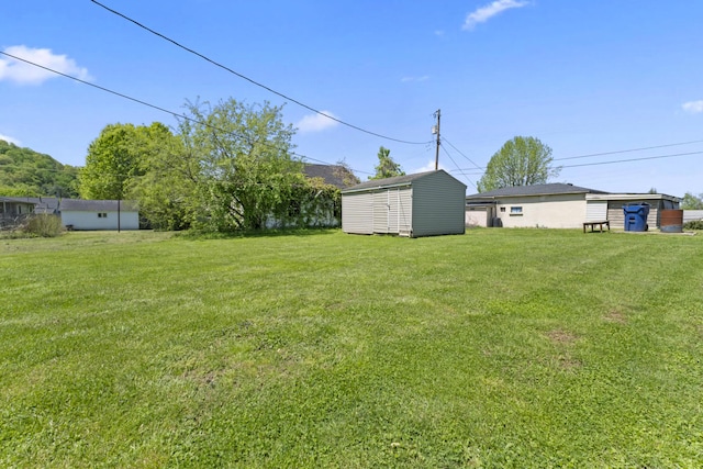 30 Wheeler St, South Shore, KY 41175 - view of yard with a storage unit and an outdoor structure