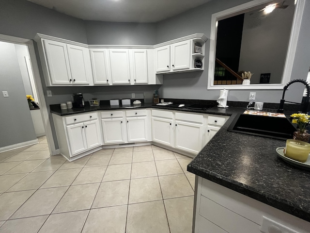 300 Woodlawn Dr, Carrolton, KY 41008 - kitchen featuring a sink, light tile patterned floors, white cabinets, black electric stovetop, and dark countertops