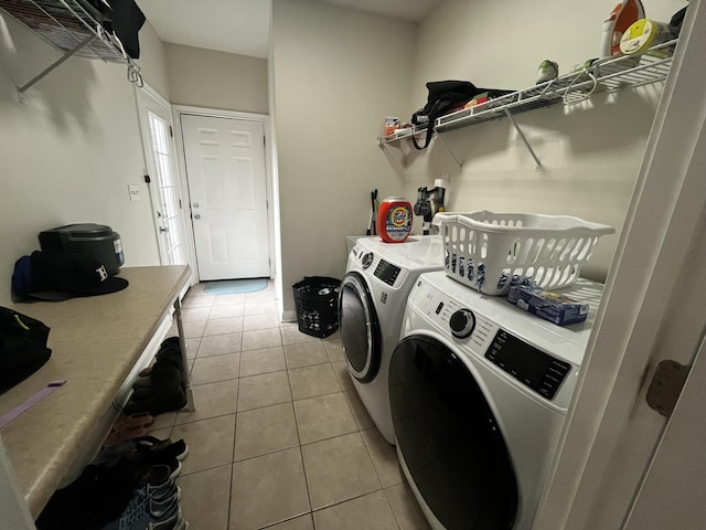 300 Woodlawn Dr, Carrolton, KY 41008 - clothes washing area featuring washer and dryer and light tile patterned floors