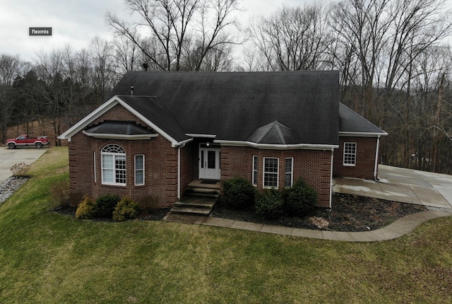 300 Woodlawn Dr, Carrolton, KY 41008 - view of front of property with brick siding and a front lawn