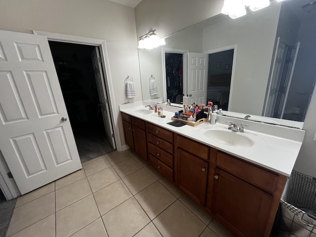 300 Woodlawn Dr, Carrolton, KY 41008 - bathroom with tile patterned floors, double vanity, and a walk in closet