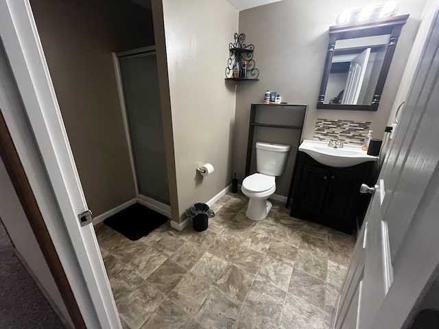 300 Woodlawn Dr, Carrolton, KY 41008 - bathroom featuring a stall shower, toilet, vanity, and baseboards