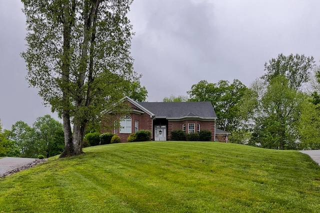 300 Woodlawn Dr, Carrolton, KY 41008 - ranch-style house with a front yard and brick siding