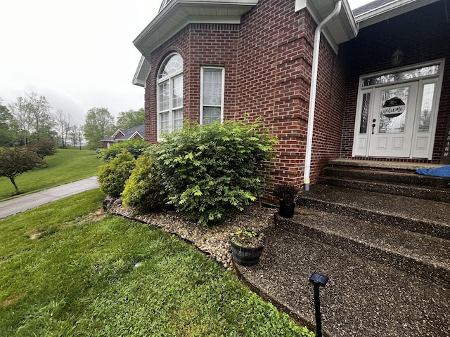 300 Woodlawn Dr, Carrolton, KY 41008 - view of side of property featuring brick siding and a lawn