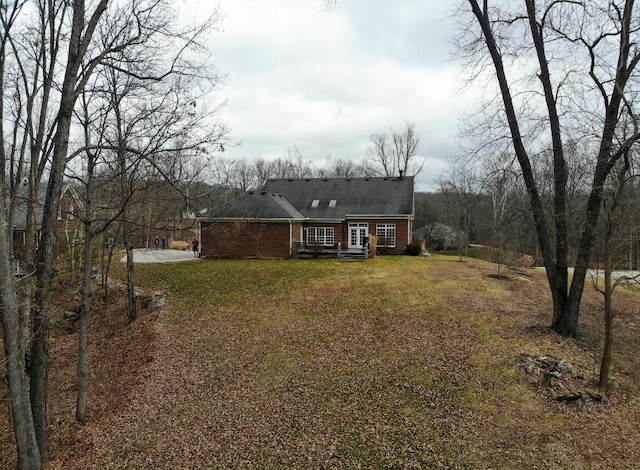 300 Woodlawn Dr, Carrolton, KY 41008 - rear view of house featuring a yard