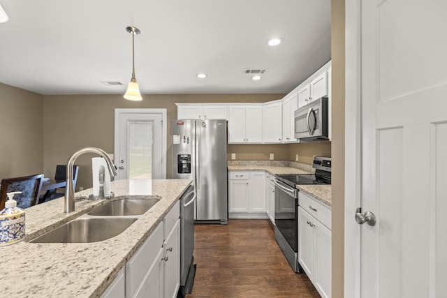 901 Auckland Ave, Richmond, KY 40475 - kitchen with stainless steel appliances, a sink, white cabinetry, dark wood-type flooring, and recessed lighting