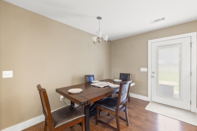 901 Auckland Ave, Richmond, KY 40475 - dining room featuring a chandelier, dark wood finished floors, and baseboards