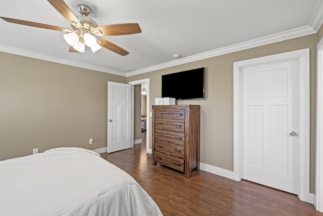 901 Auckland Ave, Richmond, KY 40475 - bedroom with crown molding, dark wood-style flooring, baseboards, and a ceiling fan