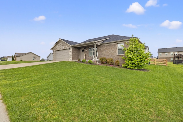 901 Auckland Ave, Richmond, KY 40475 - view of front of home with concrete driveway, brick siding, an attached garage, and roof with shingles