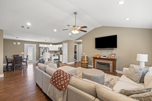 901 Auckland Ave, Richmond, KY 40475 - living area with recessed lighting, dark wood-style flooring, lofted ceiling, baseboards, and a fireplace with raised hearth