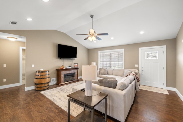 901 Auckland Ave, Richmond, KY 40475 - living room with ceiling fan, lofted ceiling, dark wood-type flooring, a stone fireplace, and baseboards