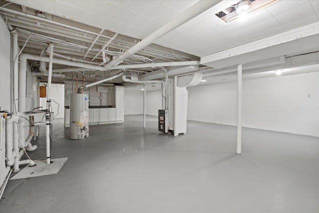unfinished below grade area featuring gas water heater