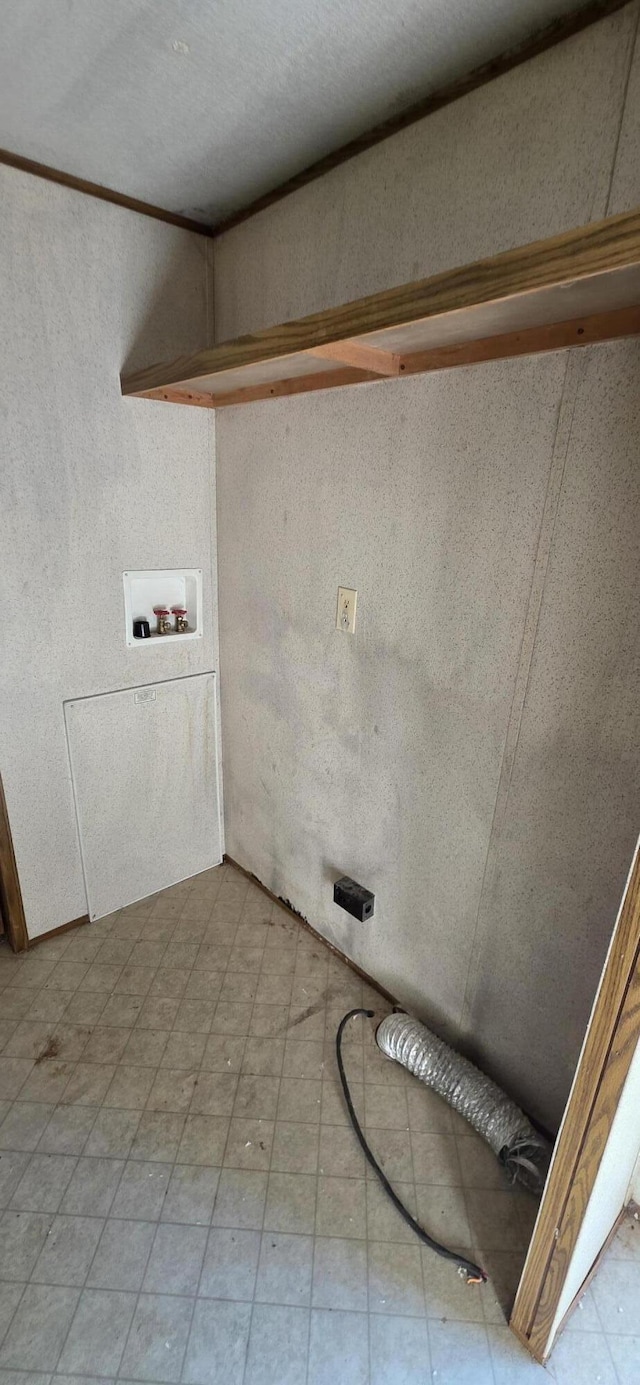 laundry room featuring laundry area and washer hookup