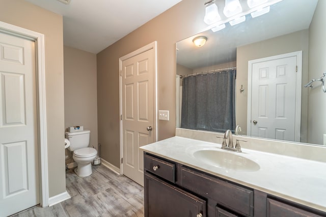 165 Meridian Way, Richmond, KY 40475 - full bathroom with toilet, baseboards, wood finished floors, and vanity