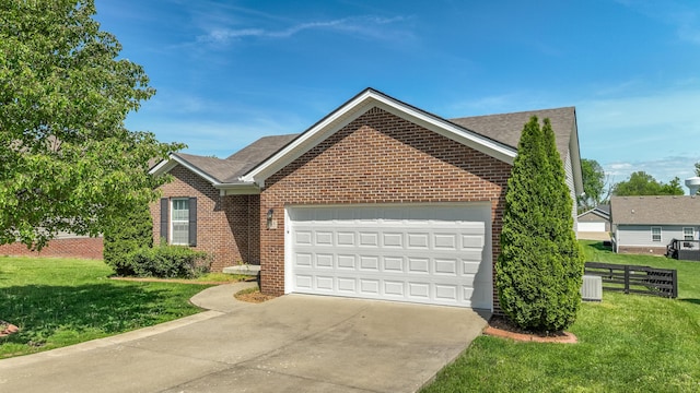 165 Meridian Way, Richmond, KY 40475 - single story home with a front yard, brick siding, fence, concrete driveway, and an attached garage