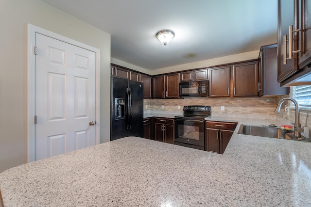 165 Meridian Way, Richmond, KY 40475 - kitchen with dark brown cabinetry, light stone countertops, a sink, tasteful backsplash, and black appliances