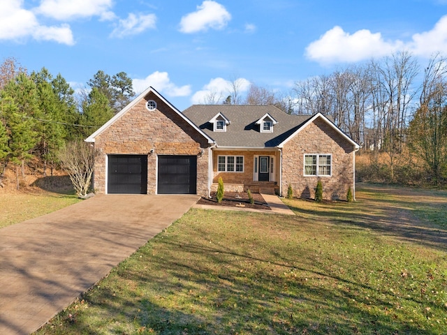 traditional-style home featuring an attached garage, driveway, a front lawn, and stone siding