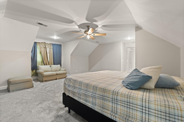 carpeted bedroom featuring visible vents, a ceiling fan, baseboards, and lofted ceiling