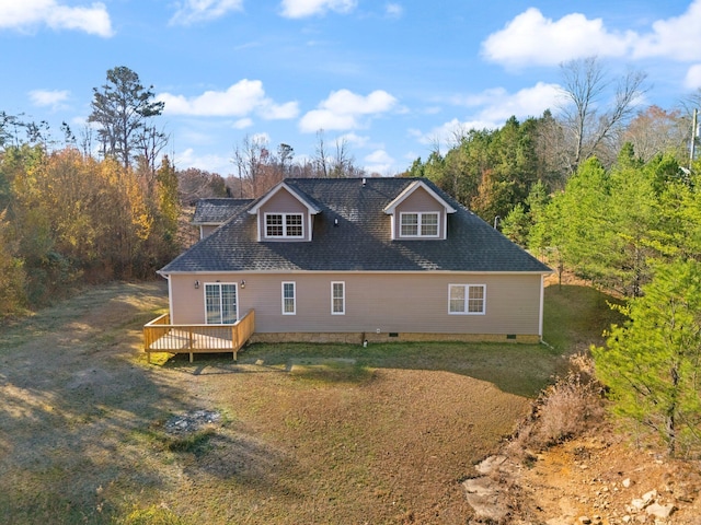 back of house with a lawn, a shingled roof, a wooden deck, and crawl space