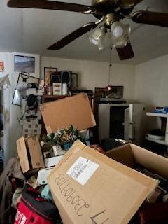 interior space featuring a ceiling fan