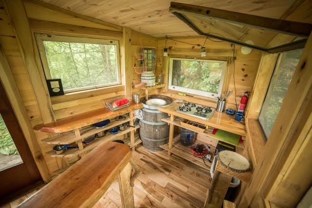 interior space featuring wood ceiling and wood finished floors