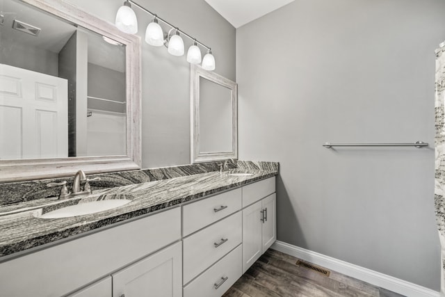 1620 Hannah Dr, Lawrenceburg, KY 40342 - full bath featuring a sink, wood finished floors, and visible vents