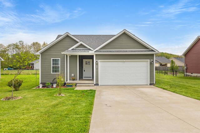1620 Hannah Dr, Lawrenceburg, KY 40342 - view of front of property featuring concrete driveway, an attached garage, and roof with shingles