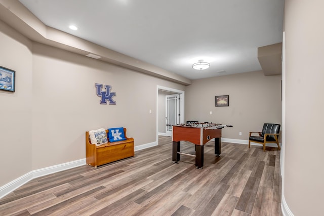 rec room featuring baseboards, recessed lighting, and wood finished floors