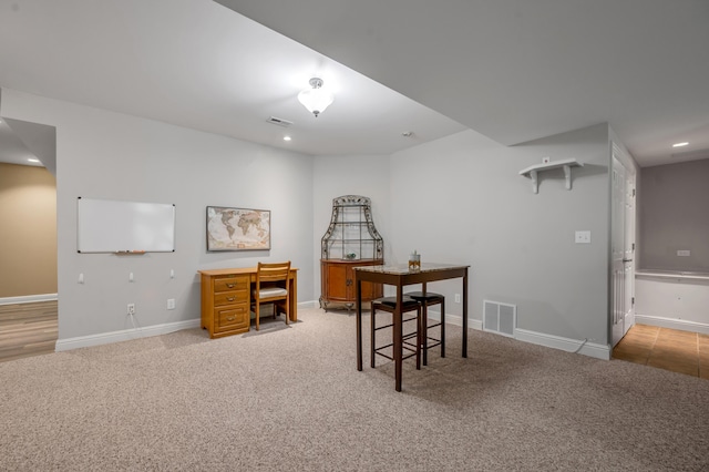 carpeted office with baseboards, recessed lighting, and visible vents