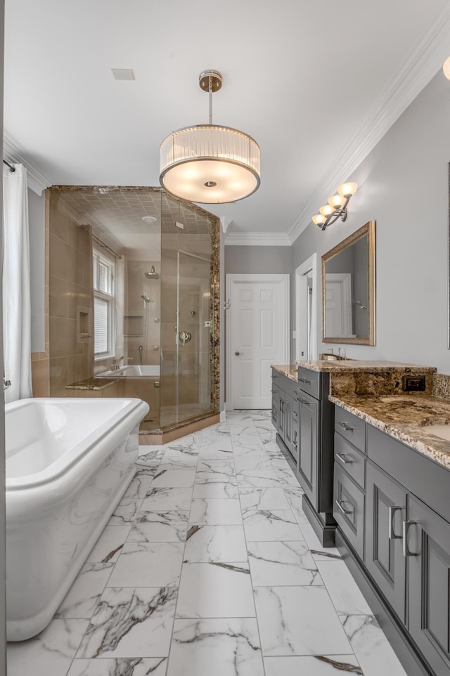 full bath with crown molding, a freestanding bath, a shower stall, and vanity