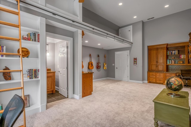 interior space with baseboards, recessed lighting, and visible vents
