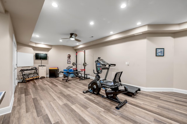 workout room featuring baseboards, recessed lighting, ceiling fan, and wood finished floors