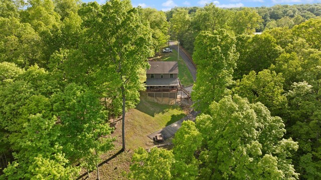bird's eye view featuring a view of trees