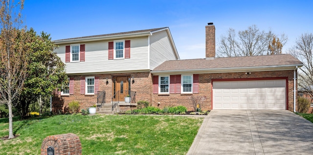 traditional-style home with a chimney, a front yard, a garage, brick siding, and concrete driveway