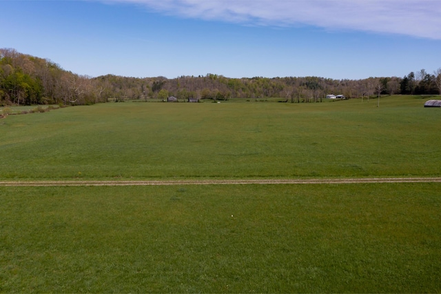 534 Lower Gilmore Rd, Campton, KY 41301 - surrounding community featuring a wooded view
