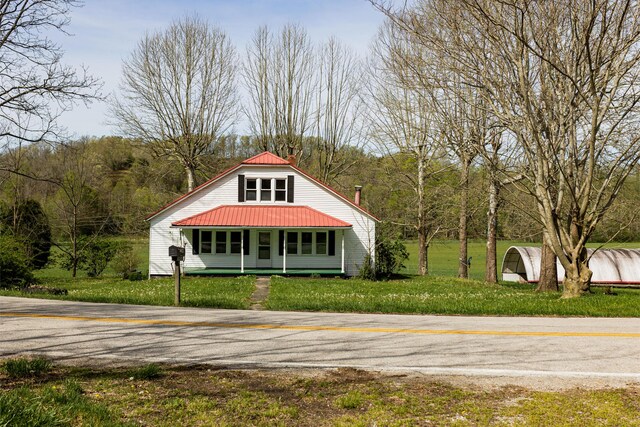 534 Lower Gilmore Rd, Campton, KY 41301 - view of front of property with a chimney, metal roof, and a front yard