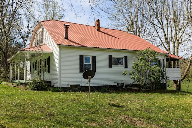 534 Lower Gilmore Rd, Campton, KY 41301 - rear view of property with a lawn, a chimney, a sunroom, and metal roof