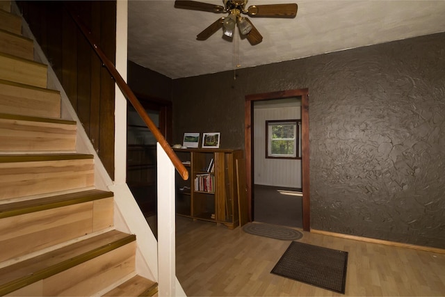 534 Lower Gilmore Rd, Campton, KY 41301 - entrance foyer featuring a ceiling fan, wood finished floors, and stairway