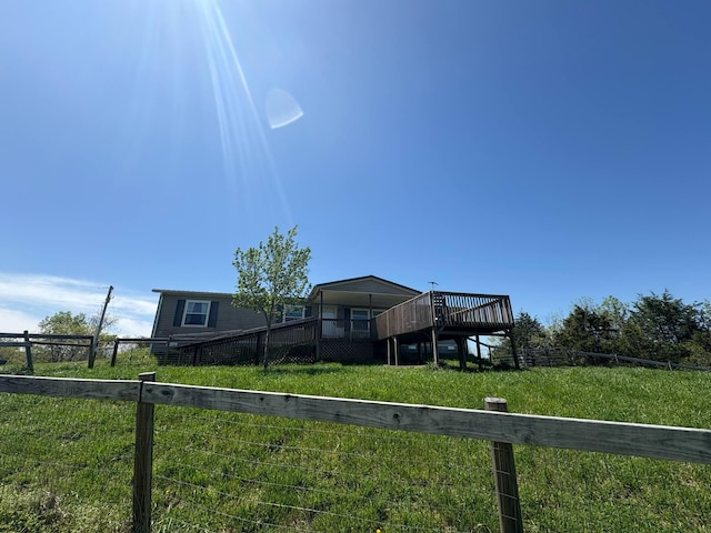 980 Persimmon Ridge Rd, Carlisle, KY 40311 - exterior space featuring a yard, fence, and a wooden deck
