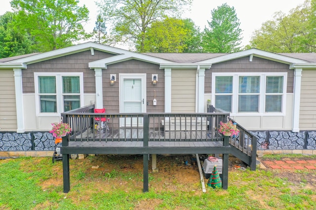 6989 W Laurel Rd, London, KY 40741 - manufactured / mobile home with a wooden deck