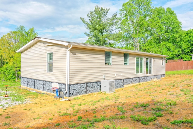 6989 W Laurel Rd, London, KY 40741 - view of home's exterior with fence and cooling unit