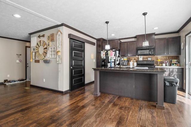 6989 W Laurel Rd, London, KY 40741 - kitchen featuring dark brown cabinetry, ornamental molding, black appliances, and a center island with sink