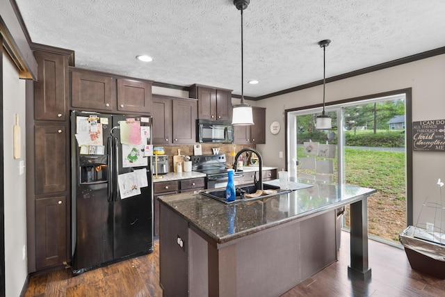 6989 W Laurel Rd, London, KY 40741 - kitchen featuring dark wood-style flooring, black appliances, an island with sink, and a sink