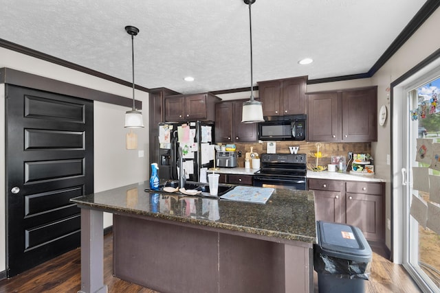 6989 W Laurel Rd, London, KY 40741 - kitchen with dark brown cabinets, a sink, crown molding, black appliances, and tasteful backsplash